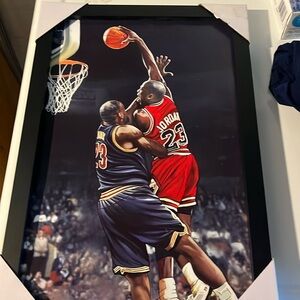 Framed Lebron James vs. Michael Jordan art print. Brand new,l! 13.5” x 19.5”.